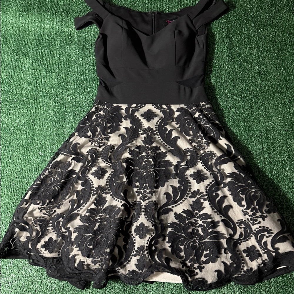 Chic Black and Cream Off-Shoulder Dress